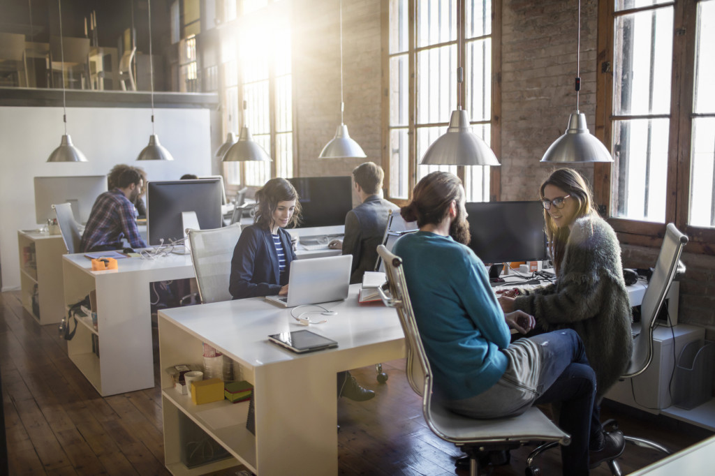 Young creative business people working in the office